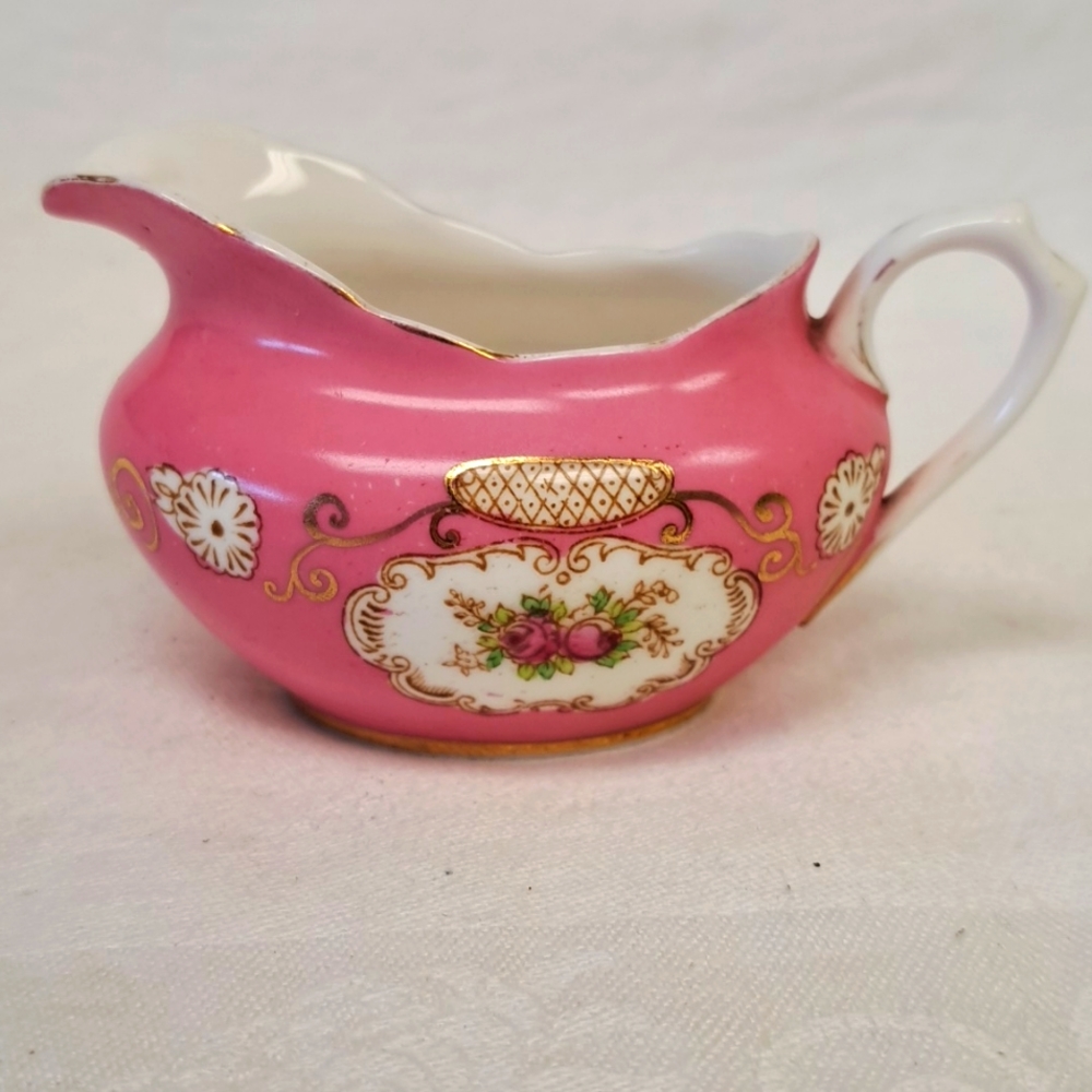 Vintage "Royal Albert Crown China " bone china pink creamer with floral design